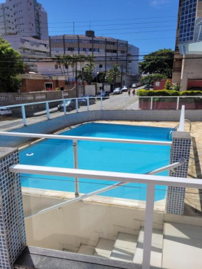 Guarujá tombo 150 metros da praia com piscina